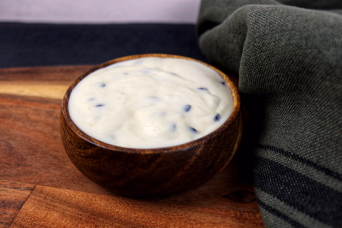 Mousse de maracujá, numa taça de vidro